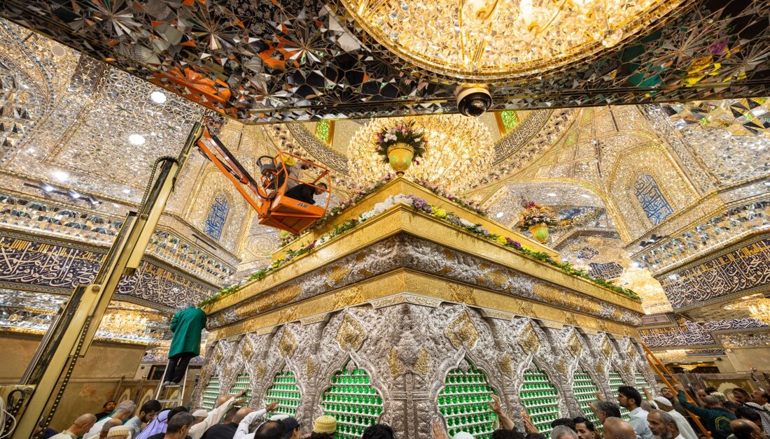 Imam Hussain (AS) Holy Shrine adorned with flowers for birth anniversary of Lady Zainab (SA)